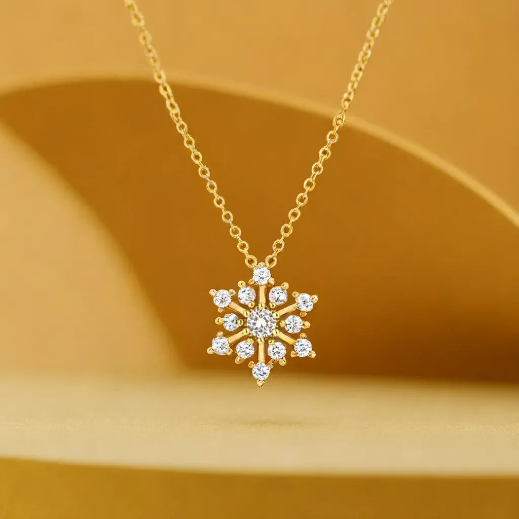 Contemporary Gold Snowflake Necklace